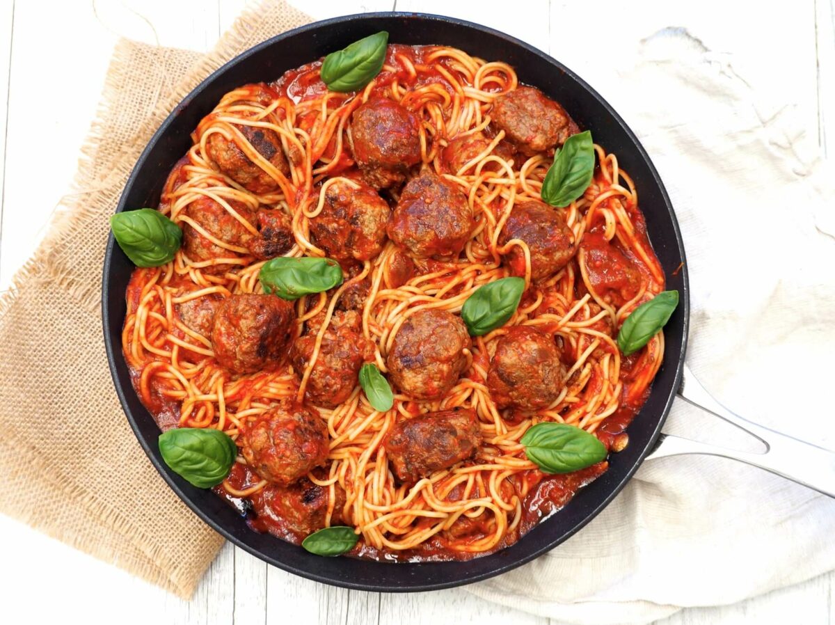 This kid-friendly 4-ingredient Spaghetti + Meatballs Recipe (from Back to Basics) has two types of vegetables. Image: Lyndi Cohen